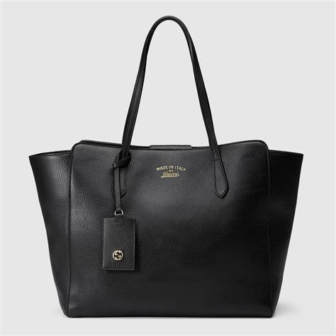 gucci swing bag uk|Gucci luggage.